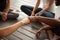 African and caucasian men fist bumping at group meeting, closeup