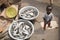 African child with two fish baskets in Accra, Ghana