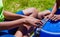 African Children fixing a puncture on a bike