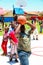 African children making a goal shot on public playground basketball court