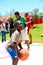 African children making a goal shot on public playground basketball court