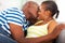 African couple kissing