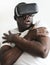 African descent man using VR playing game