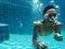 African descent woman underwater in swimming pool