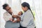 African doctor woman using a stethoscope, checking the respiratory system and heartbeat of a baby newborn