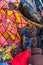 African doll souvenirs lie in a basket at Diani Beach, Kenya, close up