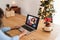 African family doing video call during Christmas time - Focus on right hand