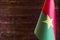 African flags Fragment of the flag of Burkina Faso in the foreground space for text blurred background flag of the Republic of Bur