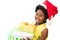 African girl wearing christmas hat with presents.