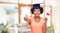 African graduate student with books and diploma