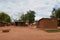 African homes with colorful clothes for drying along the road in Lolongwe, Malawi - one of the poorest countries in the world