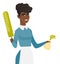 African housemaid holding spray bottle and duster.