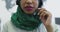African islamic businesswoman with hijab wearing a headset while standing in the modern office