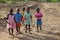 African little boys and girls standing, small kids playing