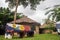 African lodge for tourists, with round shaped traditional houses called Tukul, with colorful benches around