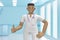 African man doctor in the medical interior of the hospital thumb up. Like, good, success. Cartoon person. 3D rendering