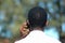 African man on phone