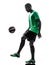 African man soccer player juggling silhouette