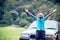 African man travelers  wear sunglasses and  hats standing and smiling with car