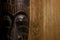 African mask over wooden background