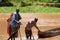 African men prepare to cross rain swollen and flooding Tana River in Kenya. Native river transportation and handmade dugout canoe