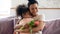 African mom hugs daughter express gratitude for attention and flowers