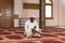 African Muslim Man Reading Holy Islamic Book Koran