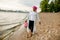 African Muslim Woman In White  Enjoying The Beach