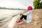 African Muslim Woman In White  Enjoying The Beach