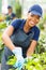 African nursery worker gardening