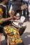 African percussionist plays in the street