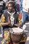 African percussionist plays in the street
