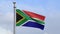 African RSA flag waving in wind with blue Sky. South Africa banner blowing