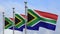 African RSA flag waving in wind with blue Sky. South Africa banner blowing