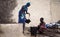 African Schoolgirls Collecting Water from Malian Well