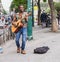 African street singer with guitar in Les Halles, Paris, France