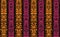 African-style orange and pink stripy pattern with Rorschach ink blot texture