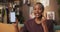 African tech-savvy content creator, uses her new smartphone to engage her audience through captivating videos discusses