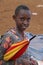 African teenage girl with umbrella at Karatu Iraqw Market