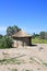 African Thatched Hut with Solar Panel in Northern Botswana