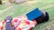 African traveler man lying sleep on the grass with opened book