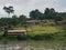 An African village is situated on the shores of the river Sangha (Republic of the Congo)