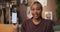 African woman embraces role as a tech reviewer, recording a detailed video where she delves into its impressive features