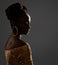 African Woman Face Profile Black Silhouette. Dark Skin Beauty Model with Gold Ring Earrings and Afro Braids Hairstyle in dress