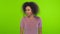 African woman gestures with annoyance scream loudly express over chromakey