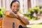 African woman with guitar