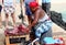 African woman market filetting Tuna fish, Cape Verde, Africa