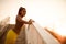 African woman standing on the stairs and stretching