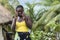 African woman visits the Axim tourist resort.