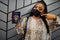 African woman wearing black face mask show Mozambique passport in hand. Coronavirus in Africa country, border closure and